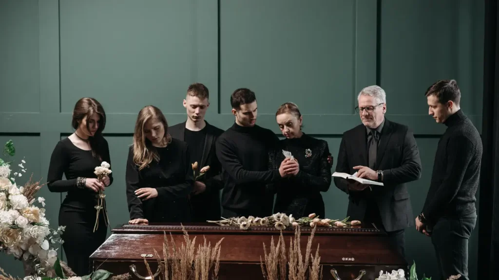 A Catholic family during a funeral service at a Catholic church.