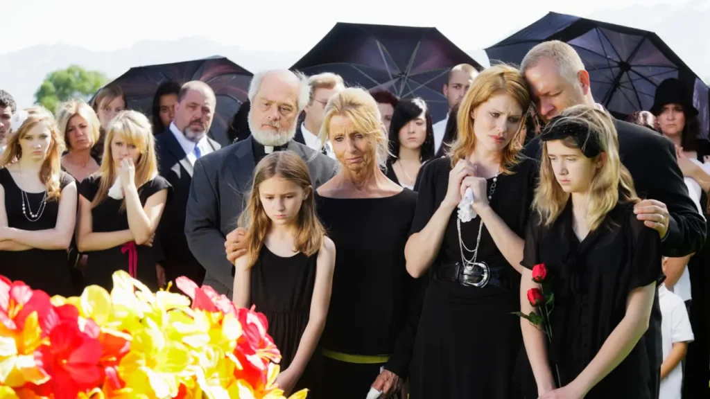 Family and relatives gathered in the cemetery to bid final goodbye.
