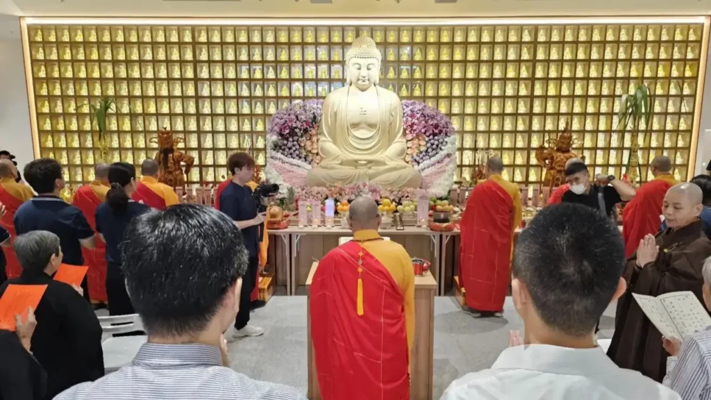 People gathered in a buddhist funeral ceremony