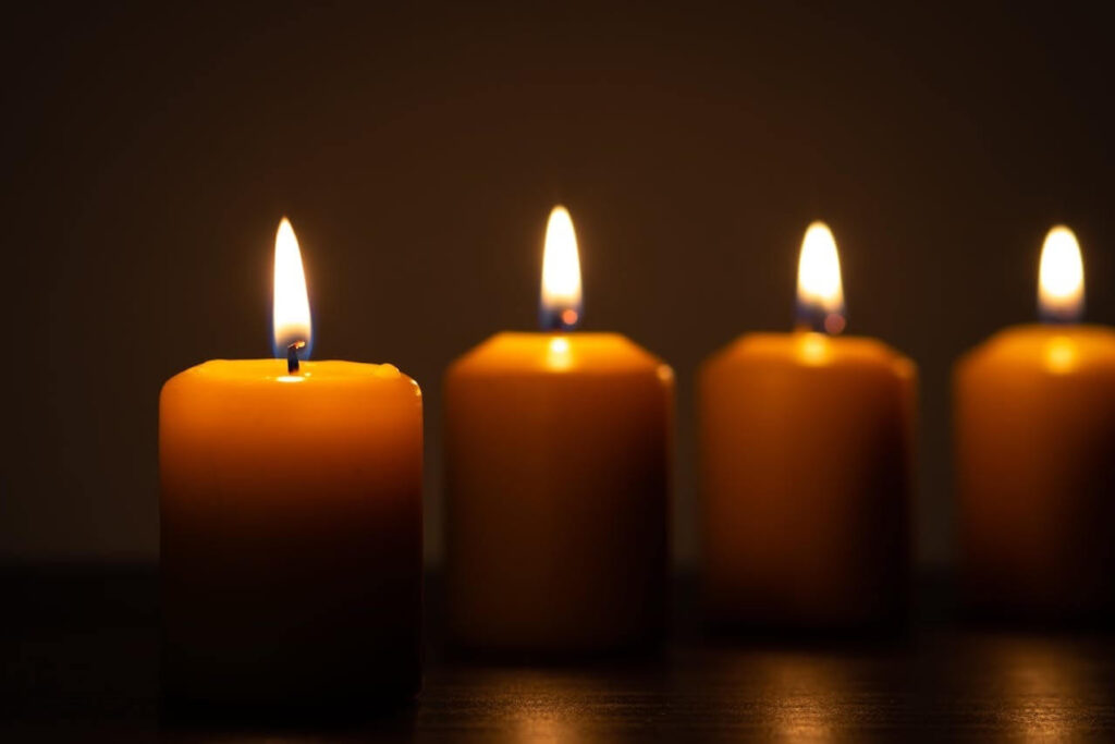 four lit candles 